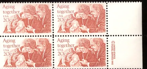 Aging Together block of four — copyright selvage