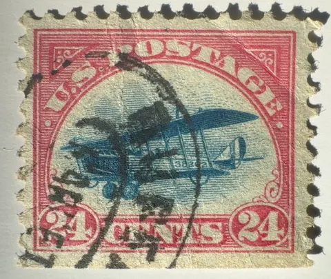 24¢ Curtiss Jenny, carmine rose & blue, downward/left vignette shift