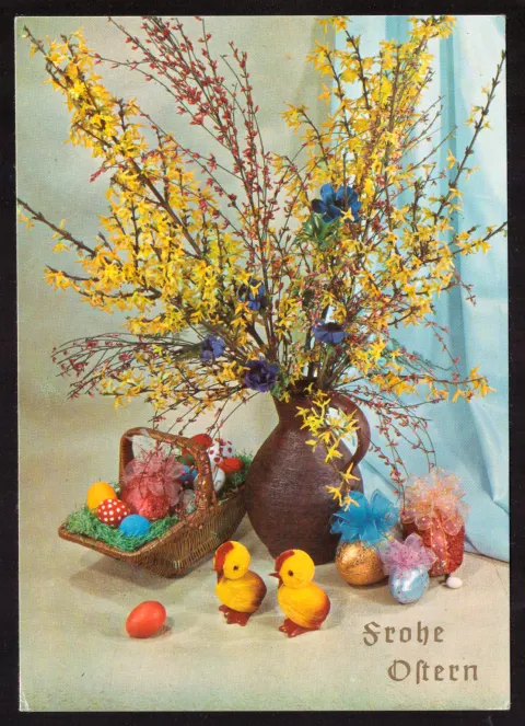 Easter greeting with chicks and flowers